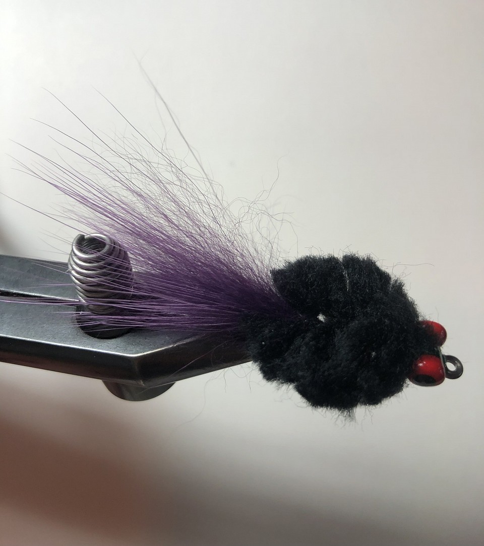 Ken Louko’s Black & Purple Crab. Redfish pattern fished on an 8 or 9 wt rod.